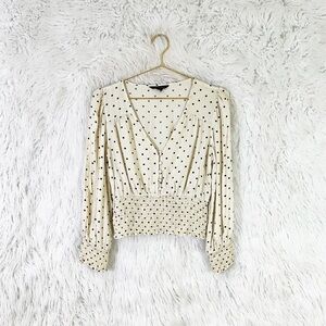 American Eagle Outfitters polka dot smocked long sleeve blouse